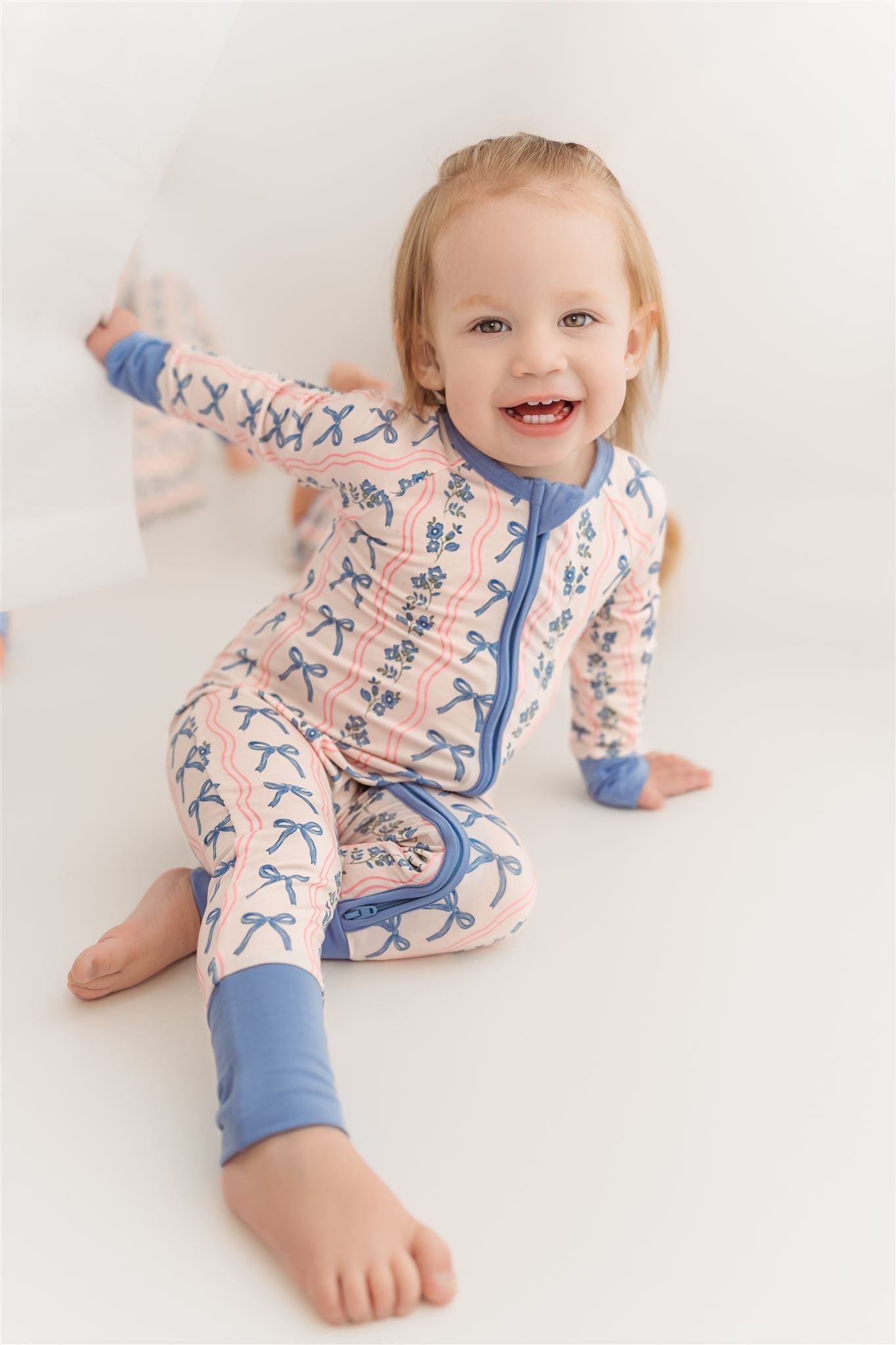 Amelia Bow Zipper Romper